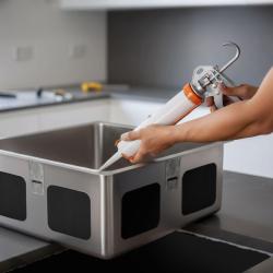 Zuurtovapaa silikoni liima ruostumattoman teräksen keittiöaltaiden asennukseen